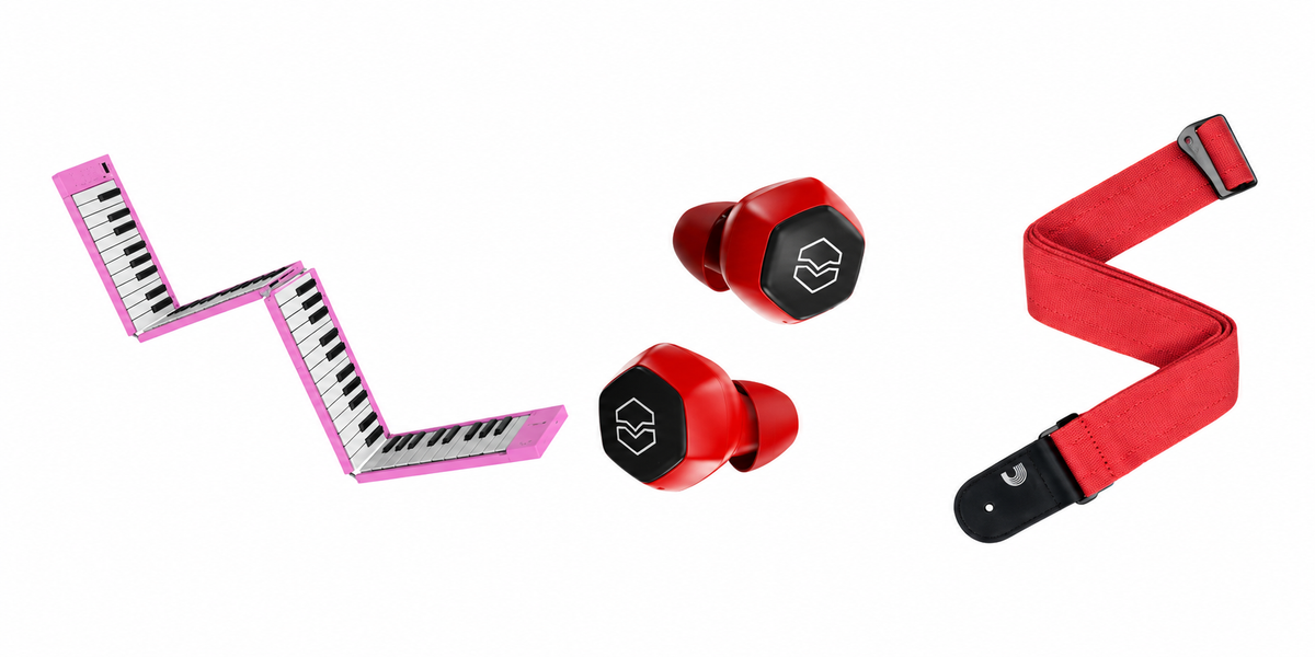 Free-gift selector with a pink Carry-On 88-key foldable piano, red V-Moda Hexamove Lite earbuds and a red D’Addario Eco Comfort guitar strap, each shown at £0.00.