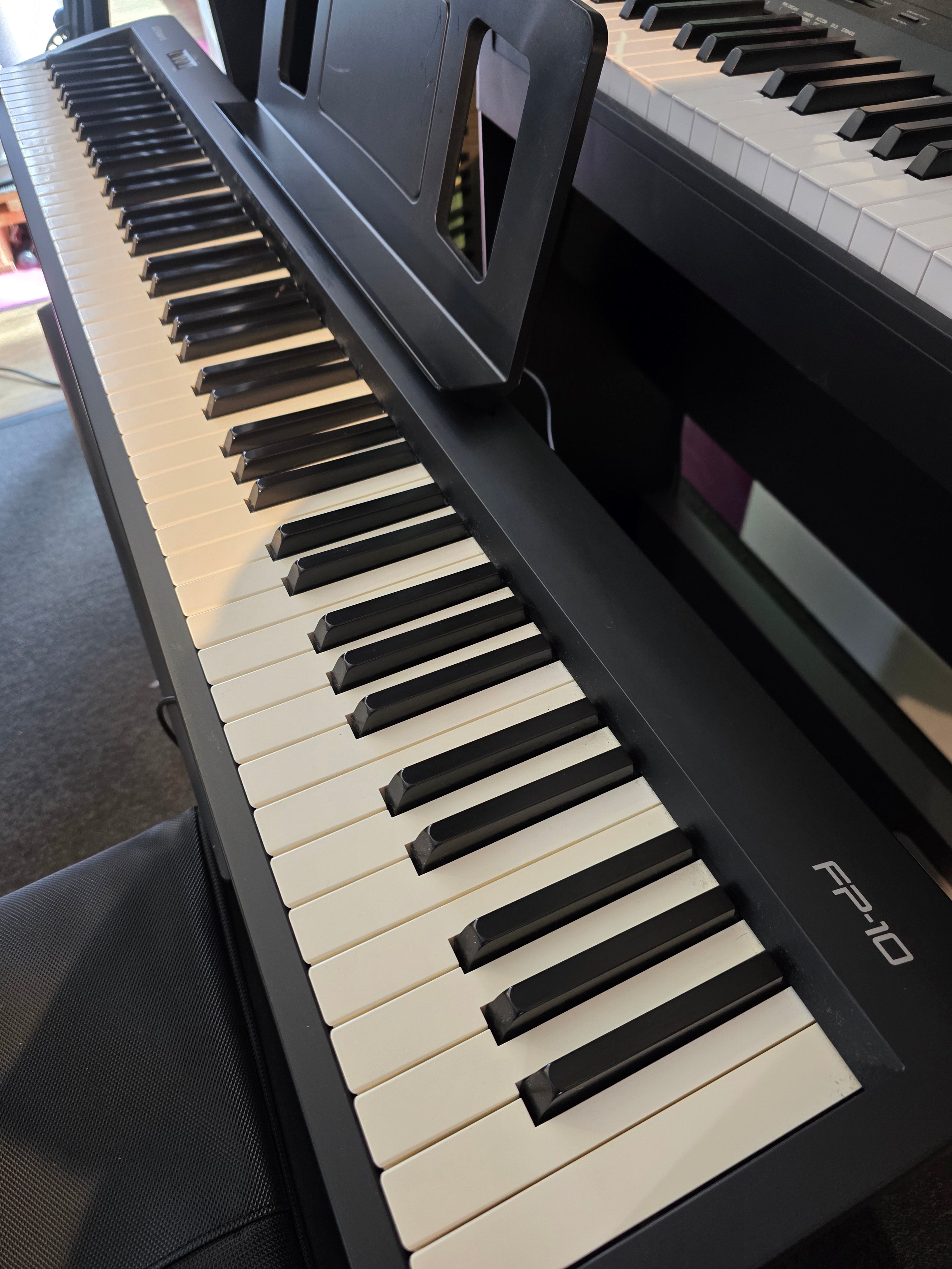 Used Roland FP-10 stage piano (s/n C6K3985) - Fair Deal Music
