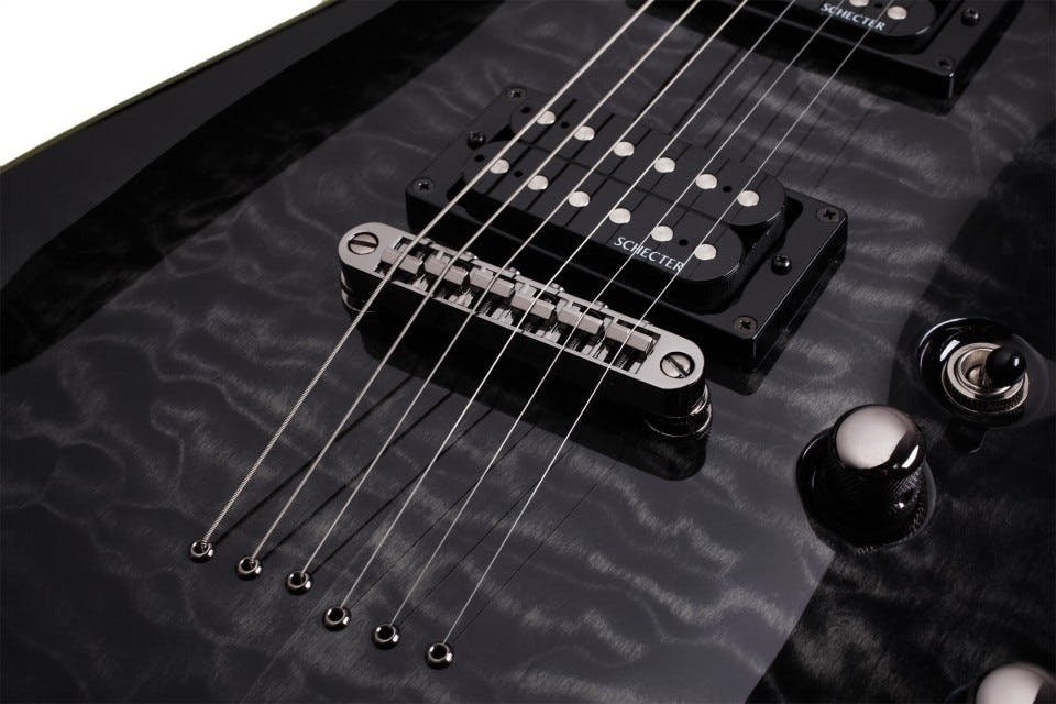 Schecter Omen Extreme-6 in See-Thru Black - Fair Deal Music