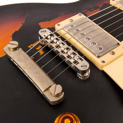 Vintage V100 ICON Electric Guitar ~ Distressed Black Over Sunburst - Fair Deal Music