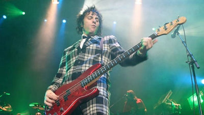 Fender Precision Bass in Candy Apple Red Electric Bass Guitar, previously owned by Tommy Stinson, (Used) (Comm) - Fair Deal Music
