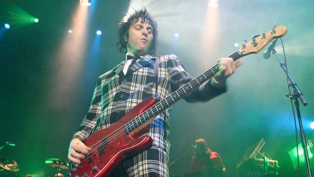 Fender Precision Bass in Candy Apple Red, previously owned by Tommy Stinson, (Used) (Comm) - Fair Deal Music