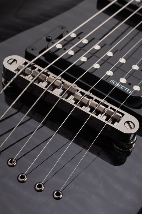 Schecter Omen Extreme-7 See Thru Black - Fair Deal Music